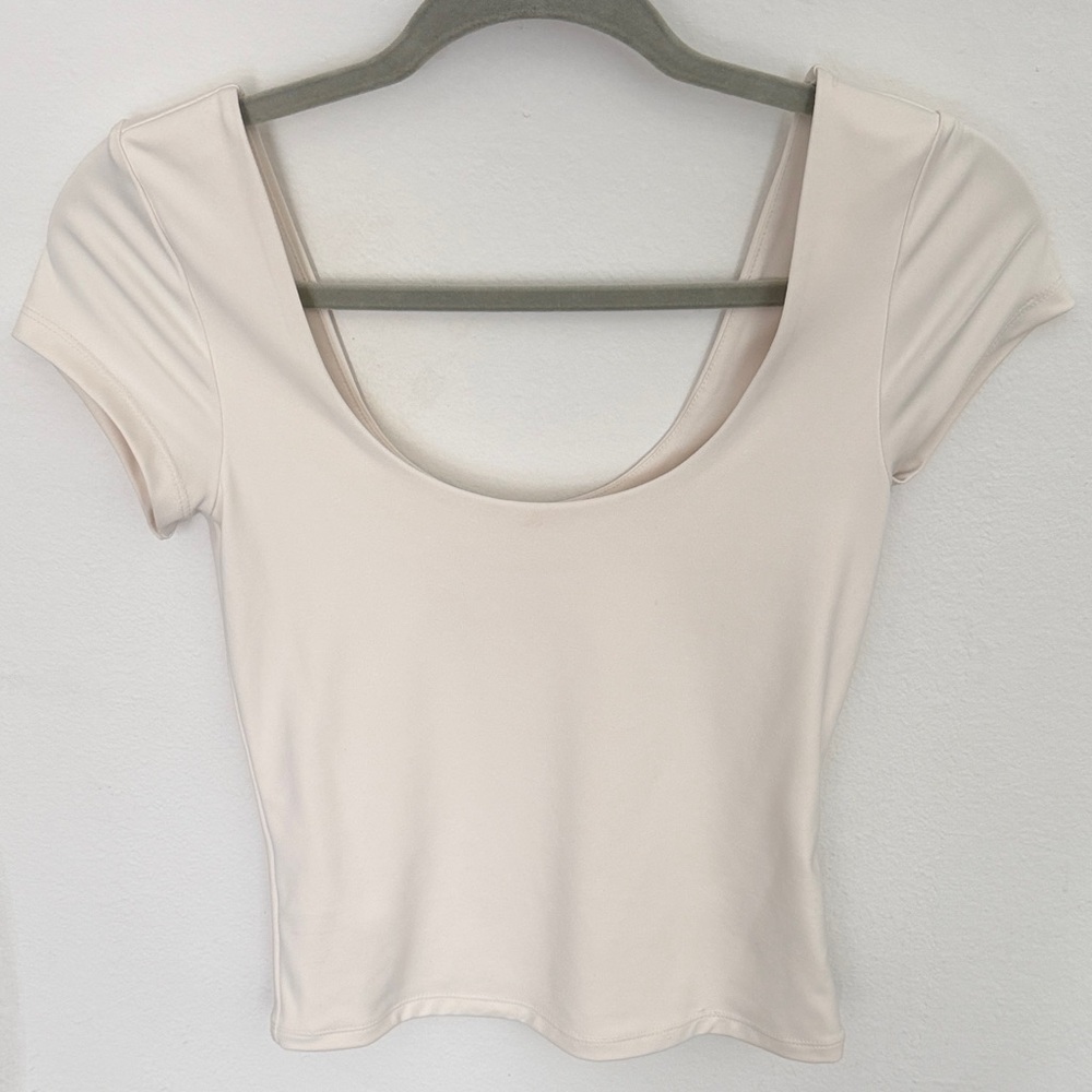 Elegant Cream Women's Top with Scoop Neckline